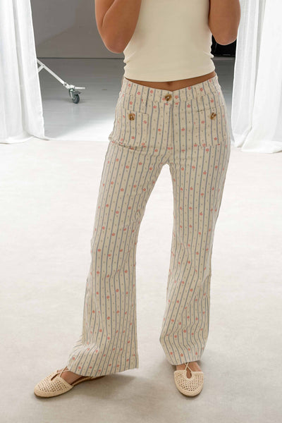 Pantalón recto de rayas con flores bordadas